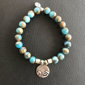 Authentic T. Jazelle sunrise bracelet.